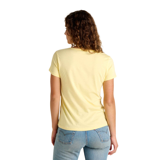 Person wearing a yellow t-shirt and blue jeans on a white background
