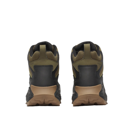 Pair of black and brown boots on a white background