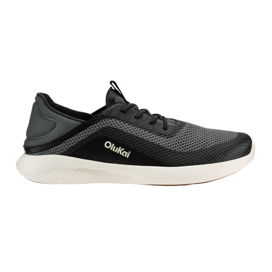 Black running shoe with white sole on a white background