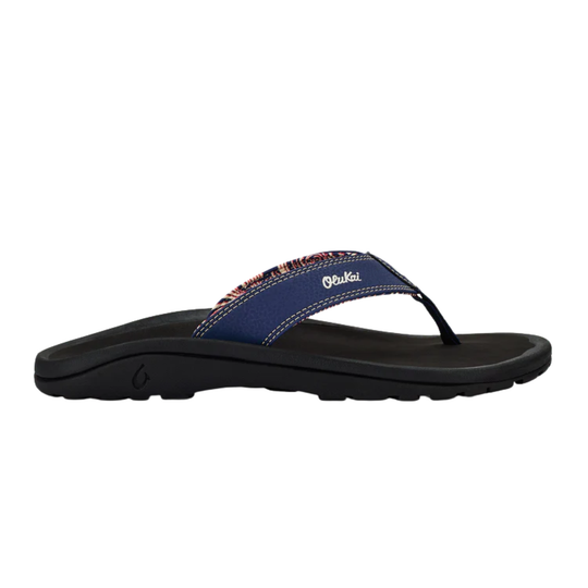Black sandal with blue strap on a white background