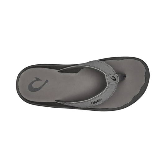 Black sandal with a strap on a white background