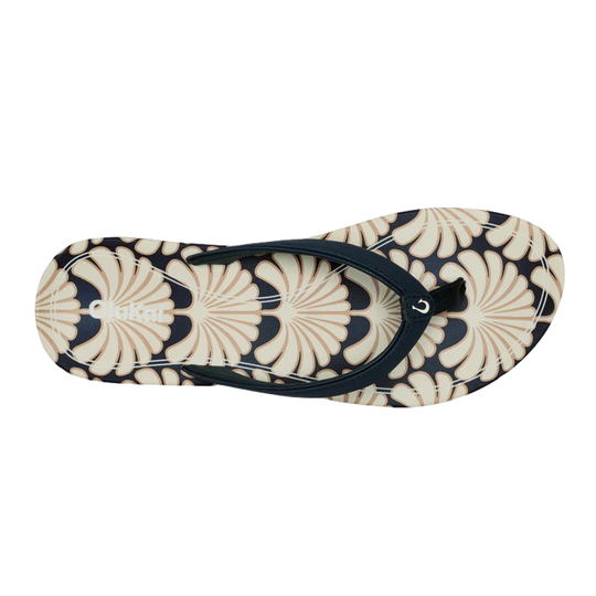 Flip-flop sandal with shell pattern on a white background
