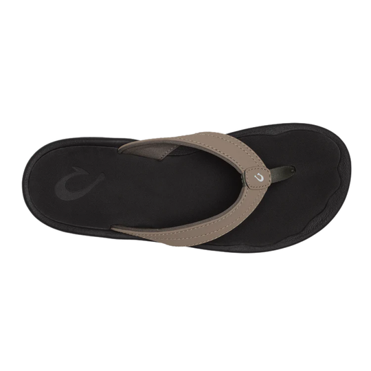 Black and brown sandal on a white background