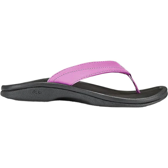 Pink and black sandal on a white background