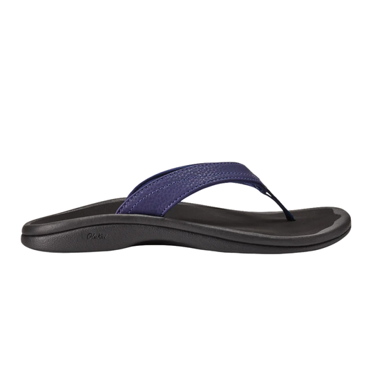 Black sandal with a blue strap on a white background
