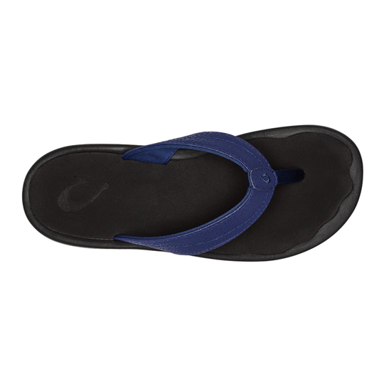 Black sandal with blue strap on a white background
