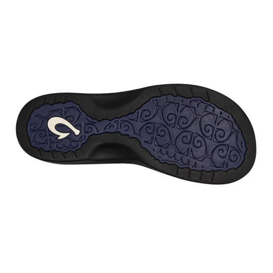 Black and blue shoe sole with a brand logo on a white background