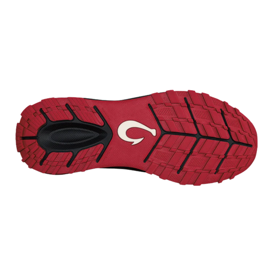 Red shoe sole with black tread pattern on a white background