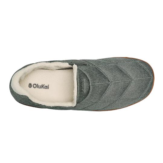 Green slipper with white interior on a white background