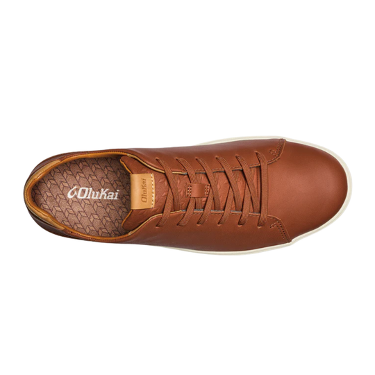 Brown leather shoe with visible brand logo on a white background