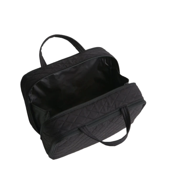 Black quilted bag on a white background