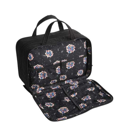 Black diaper bag with floral pattern on a white background