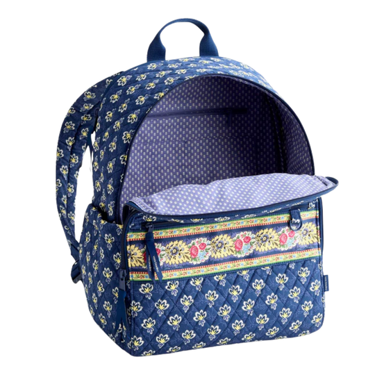 Blue floral-patterned backpack with a colorful pocket on a white background