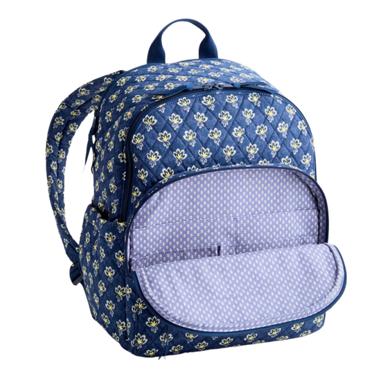 Blue floral-patterned backpack with a colorful pocket on a white background