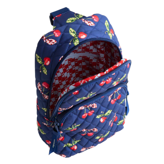 Navy blue sling bag with cherry pattern on a white background