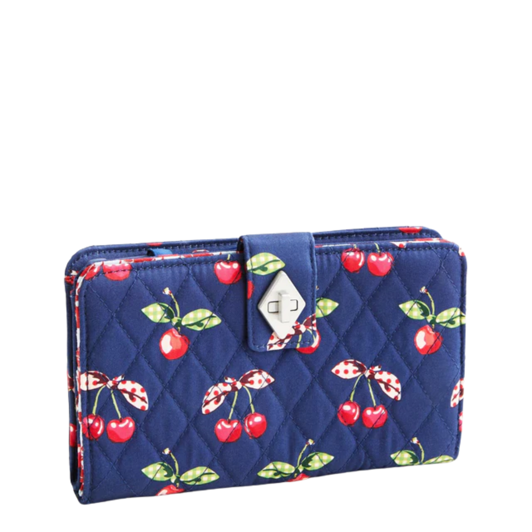Navy blue wallet with cherry pattern on a white background
