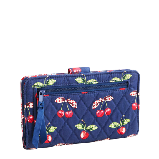 Navy blue wallet with cherry pattern on a white background