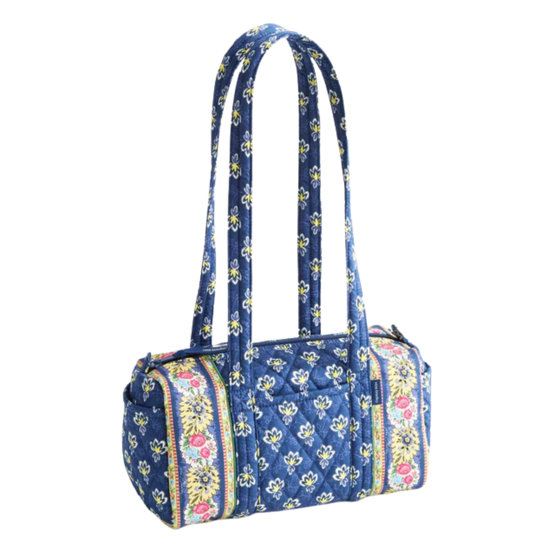 Floral patterned handbag on a white background