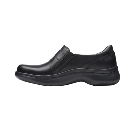 Black slip-on shoe on a white background
