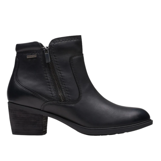 Black ankle boot with a zipper on a white background