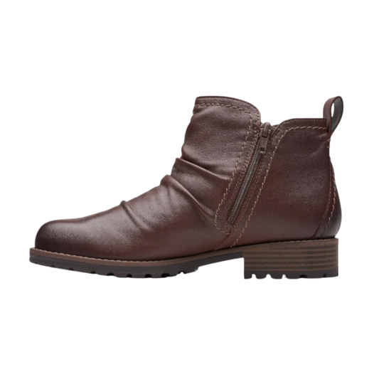 Brown leather ankle boot on a white background