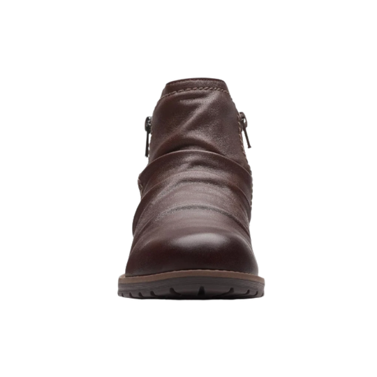 Brown leather ankle boot on a white background