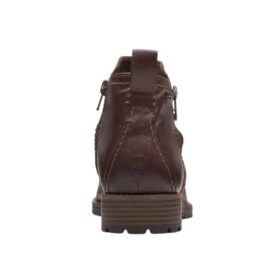 Brown leather boot on a white background