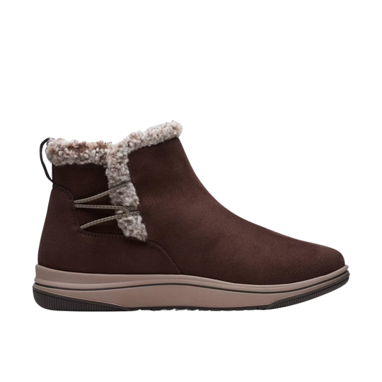 Brown ankle boot with fur trim on a white background