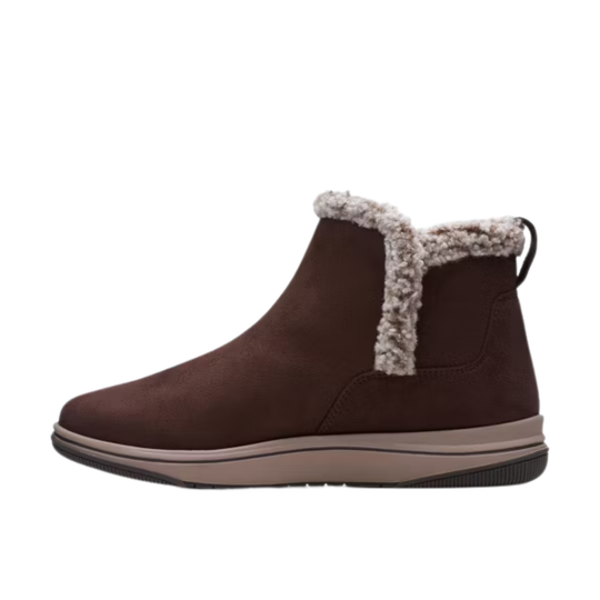 Brown ankle boot with fur trim on a white background