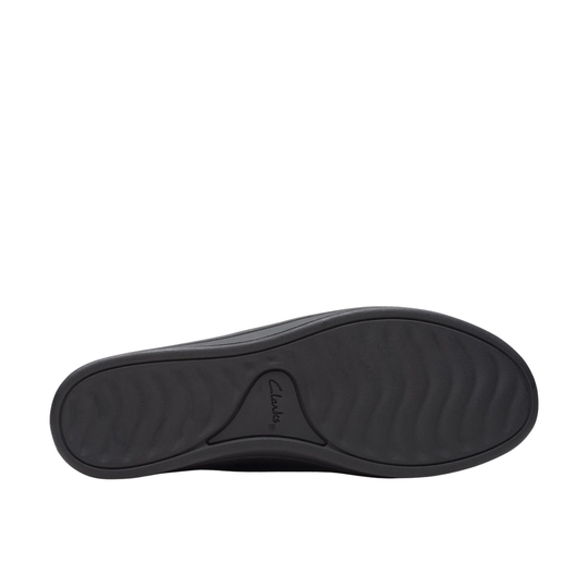 Brown shoe sole with 'Clarks' branding on a white background