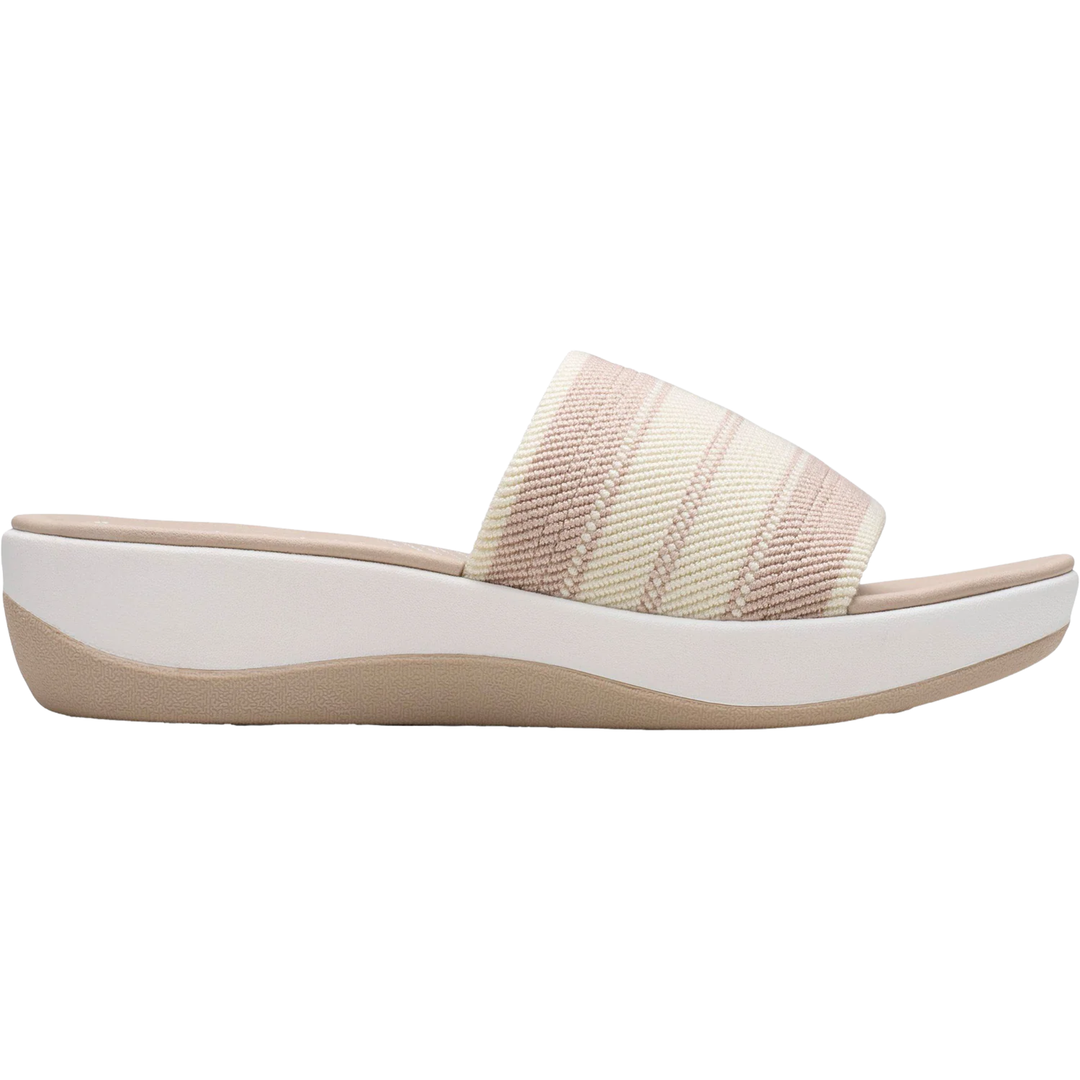 Beige sandal with a white sole on a white background