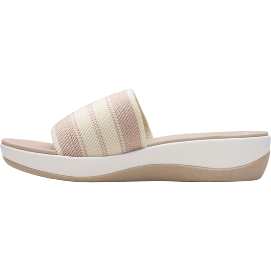 Beige slide sandal with a white sole on a white background