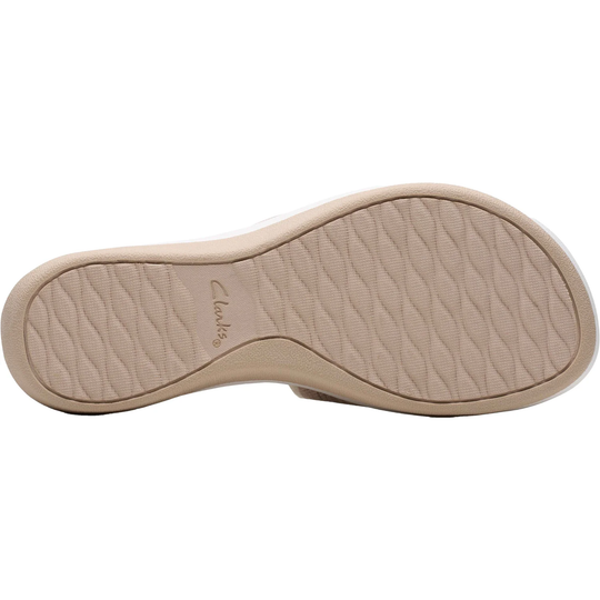 Beige shoe sole with 'Clarks' branding on a white background