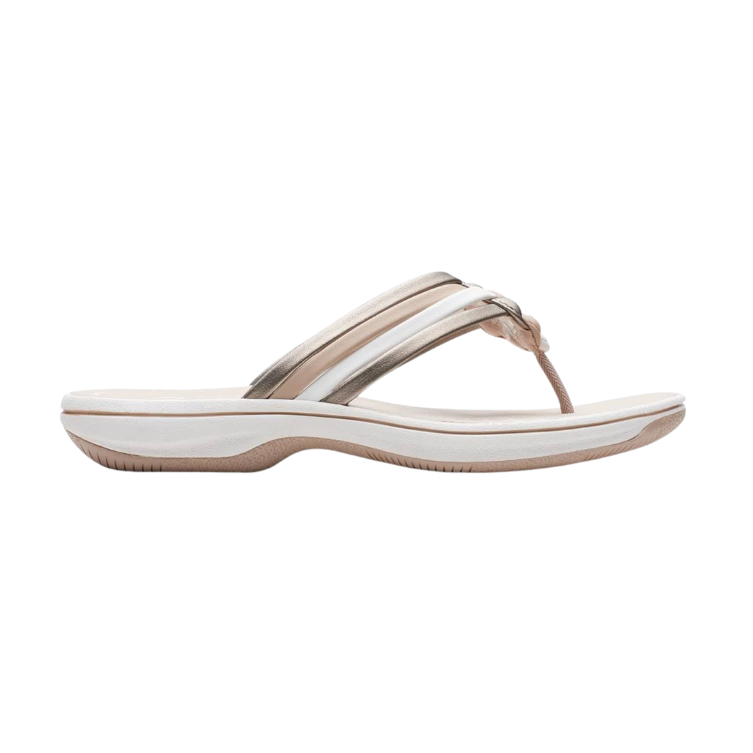 Beige and white sandal on a white background