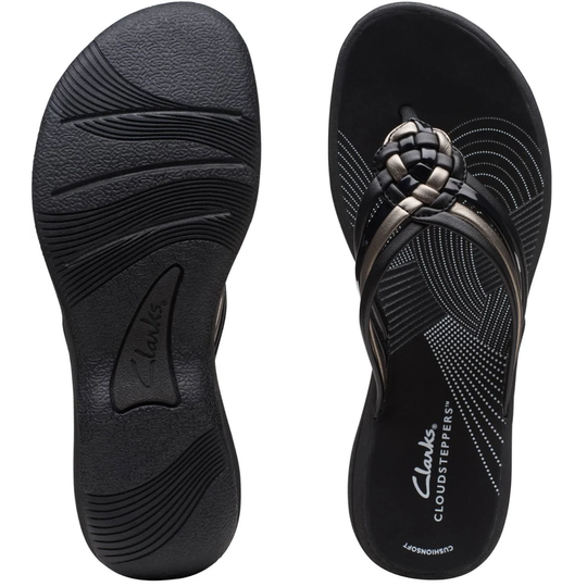 Black sandal with braided design on a white background