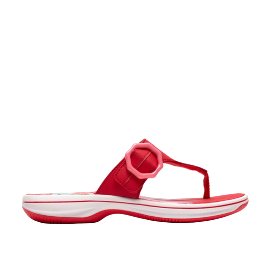 Red sandal with white sole on a white background