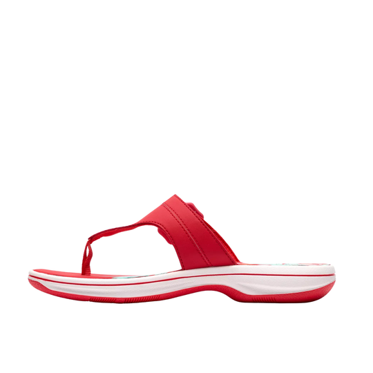 Red sandal with white sole on a white background