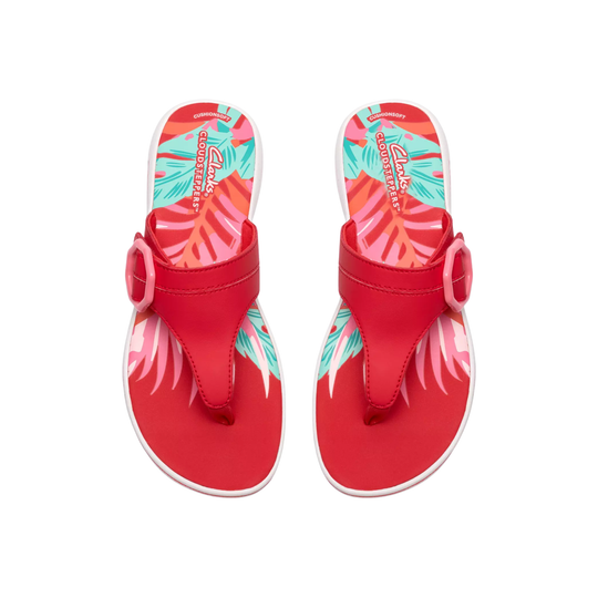 Red sandals with floral straps on a white background