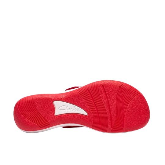 Red sandal sole with a brand logo on a white background
