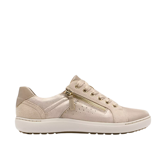 Beige sneaker with a gold zipper on a white background