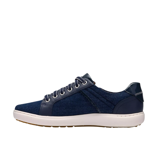 Blue sneaker with white sole on a white background