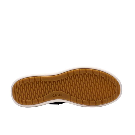 Black sole of a shoe with tread pattern on a white background