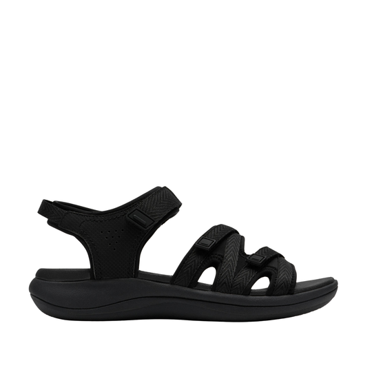 Black sandal with multiple straps on a white background