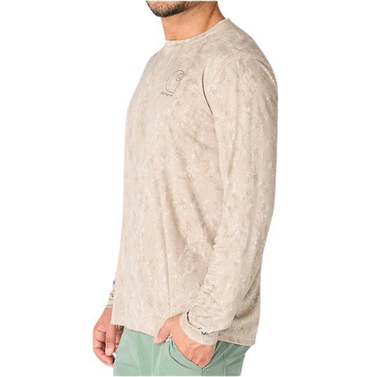 Man wearing a beige long-sleeve shirt with a subtle pattern on a white background