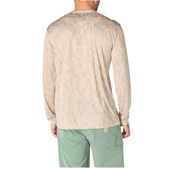 Person wearing a beige long-sleeve shirt with subtle pattern on a white background