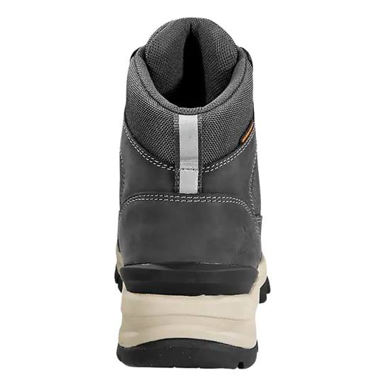 Gray work boot with beige sole on a white background