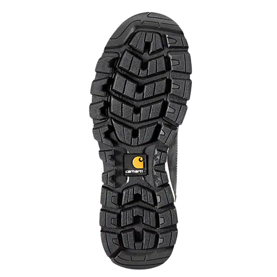 Black rugged boot outsole with deep tread and a Carhartt logo tag