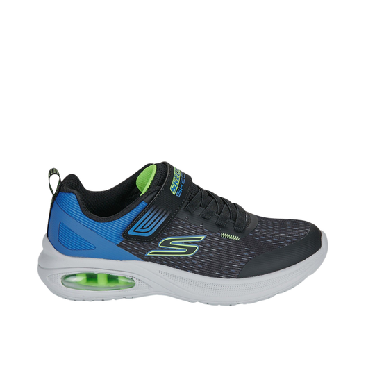 Black and blue sneaker with green accents on a white background