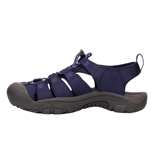 Navy sandal with a gray sole on a white background