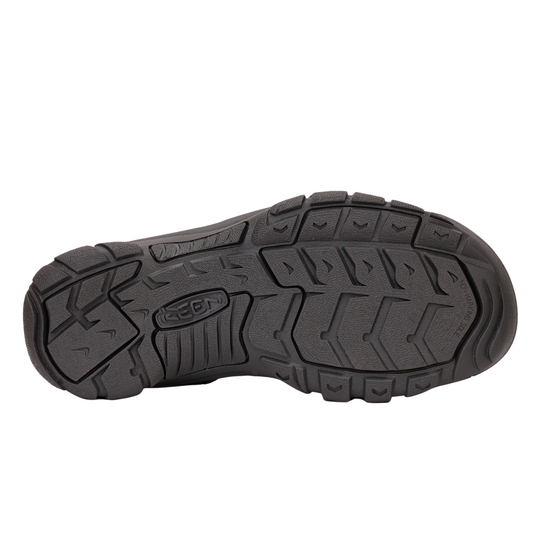 Black sole of a shoe with brand logo on a white background